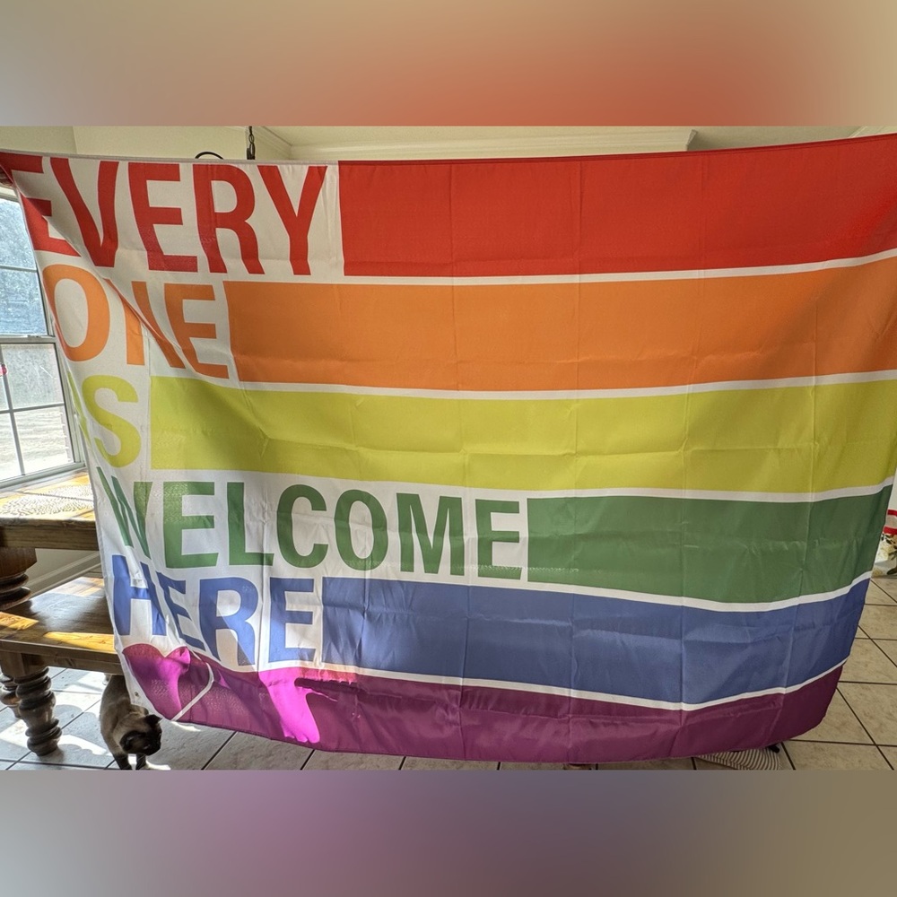 OVERSIZED “EVERYONE IS WELCOME HERE” PRIDE RAINBOW BANNER